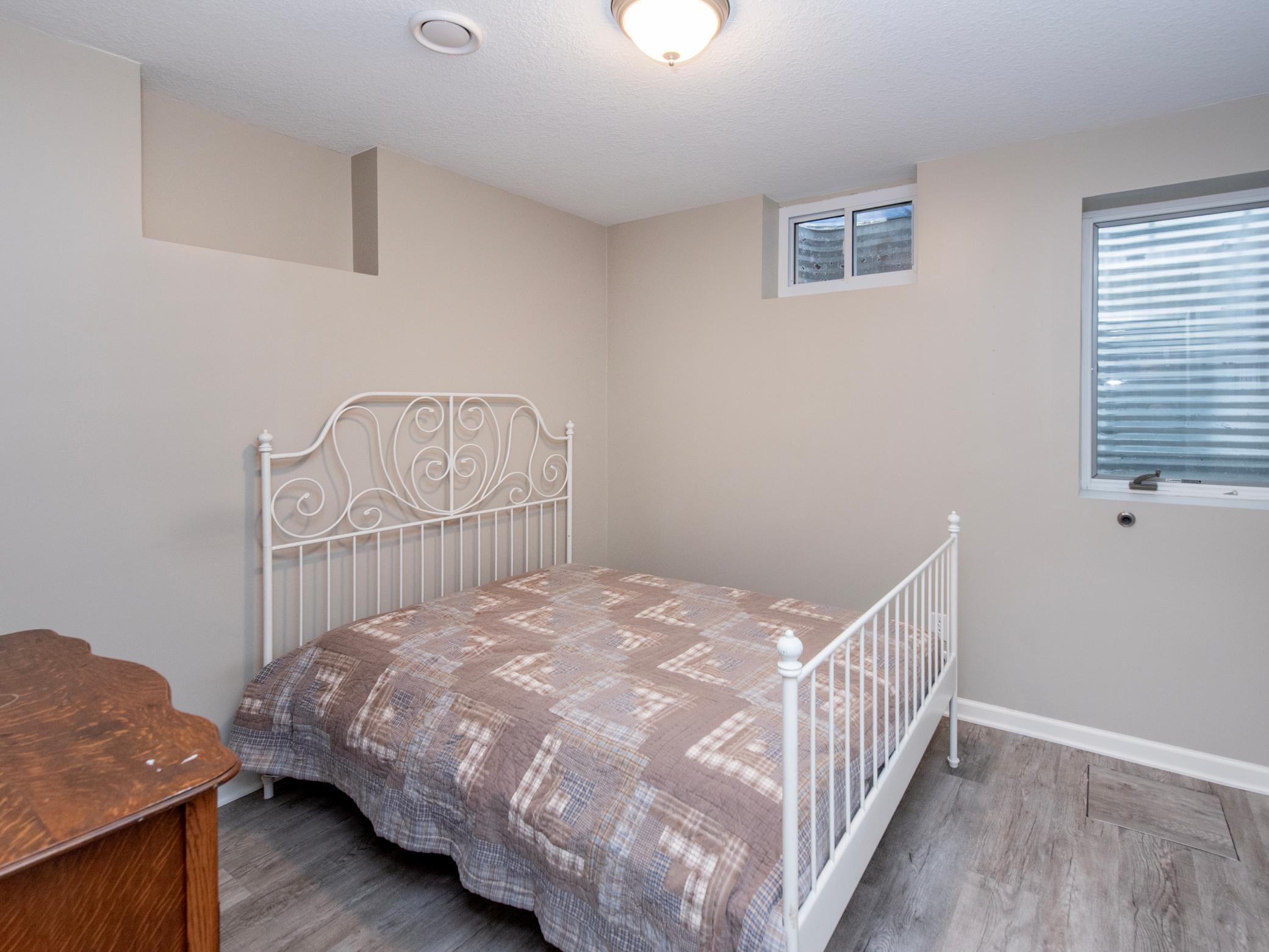 Lower level bedroom with egress window.