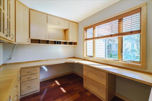Dual desk w/ abundance of cabinets and drawers including file drawers. Cherry hardwood floors