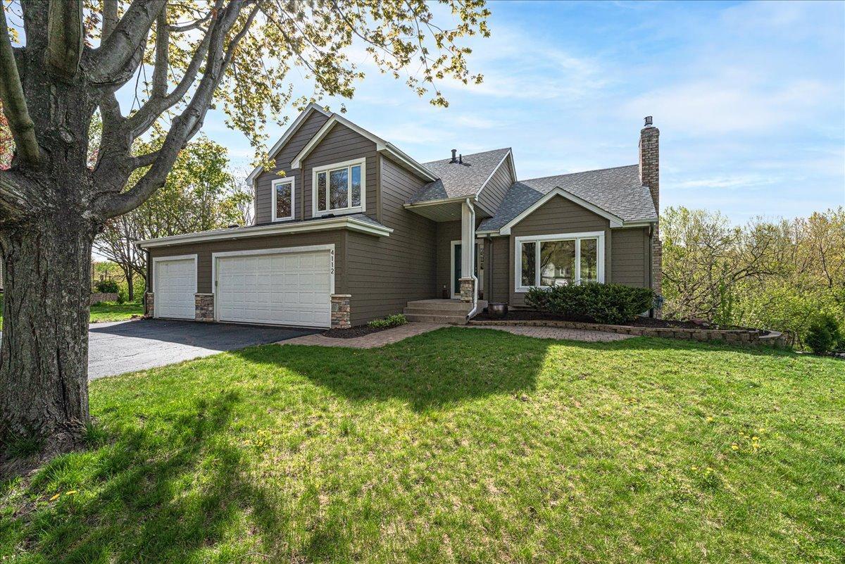 Nestled on a heavily wooded cul-de-sac lot, this beautifully updated home offers exceptional privacy, peaceful views, and incredible indoor/outdoor living spaces.