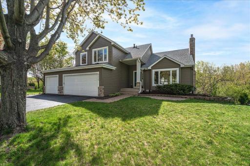 Nestled on a heavily wooded cul-de-sac lot, this beautifully updated home offers exceptional privacy, peaceful views, and incredible indoor/outdoor living spaces.