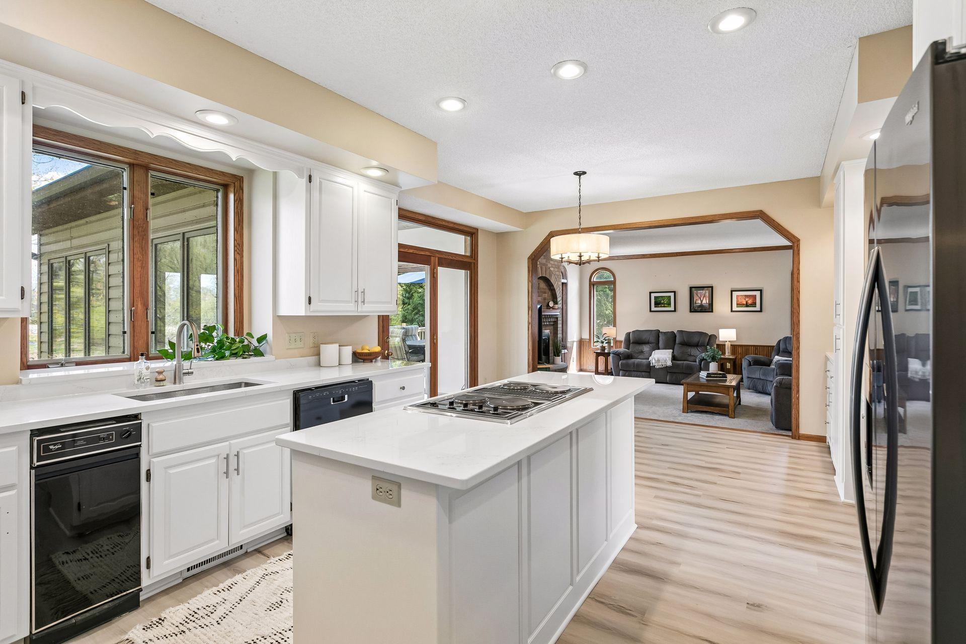 Recently updated kitchen features new quartz countertops and new LVP flooring