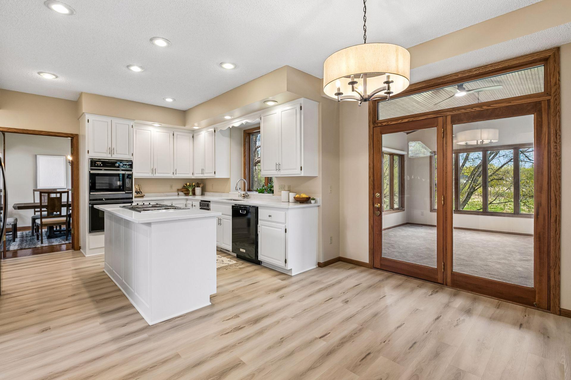 Plenty of space for your informal dining table just next to the large kitchen
