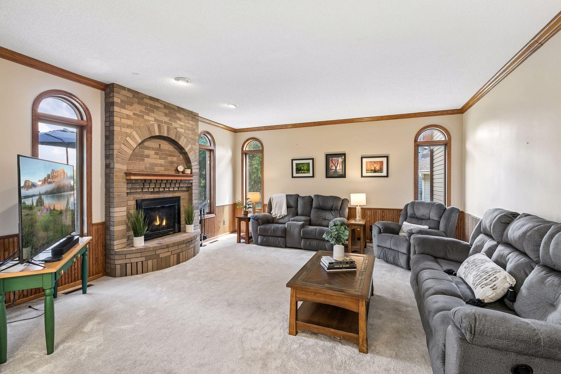 Main level family room so cozy with wood burning fireplace