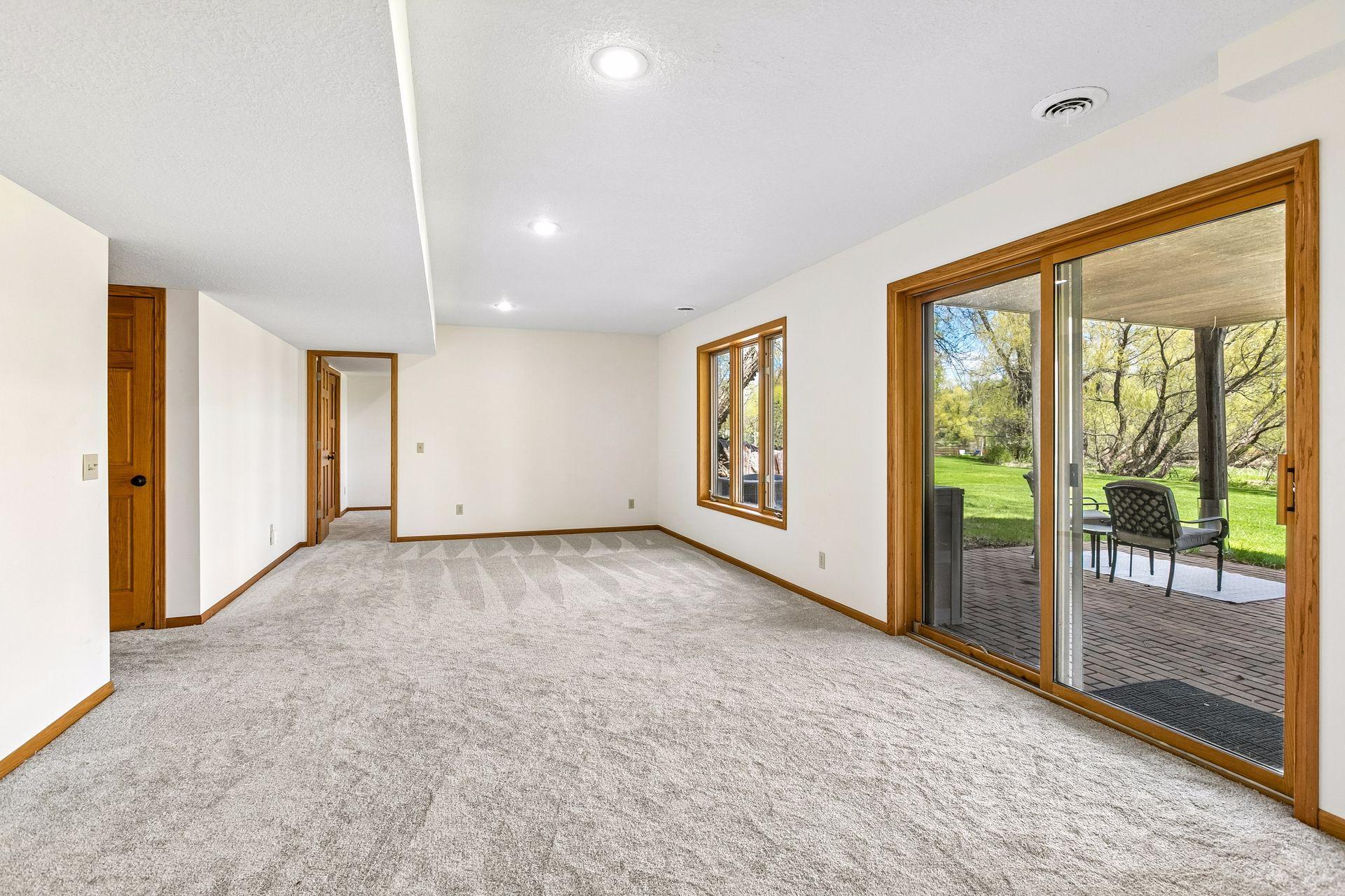 Walkout to patio and expansive backyard