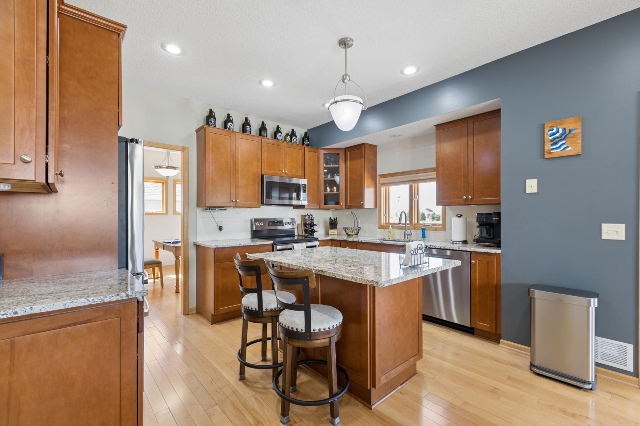 Kitchen with Center Island and Stainless Steel Appliances