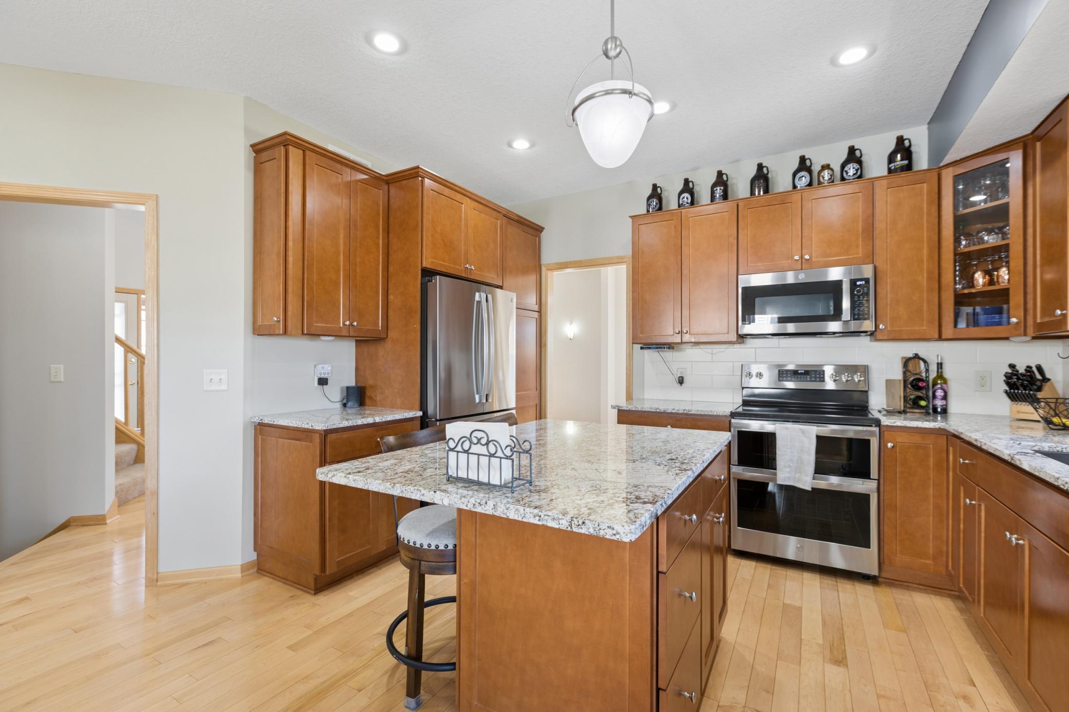 Kitchen with Center Island and Stainless Steel Appliances