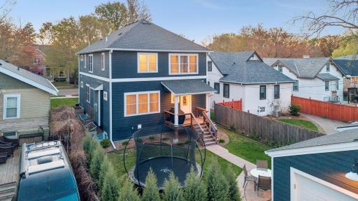 Outdoor living starts here. The rear deck, patio space, and lush backyard offer the privacy and room to breathe that's hard to find this close to 50th in France.