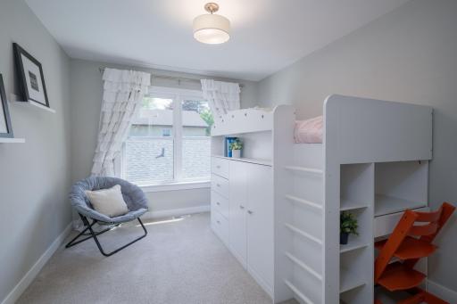 Room to play, sleep, and grow. This deliver cleverly designed bedroom features a loft bed with built-in shelving, making the most of the space in the most fun way possible.