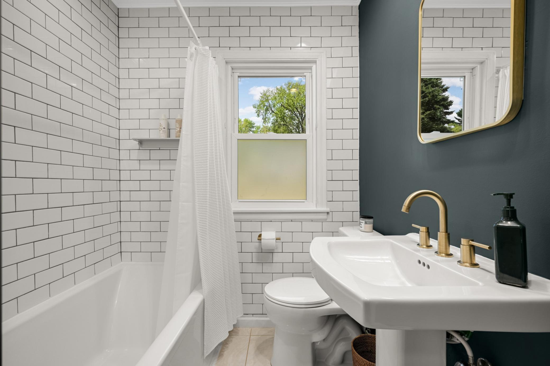 Main level full bathroom.