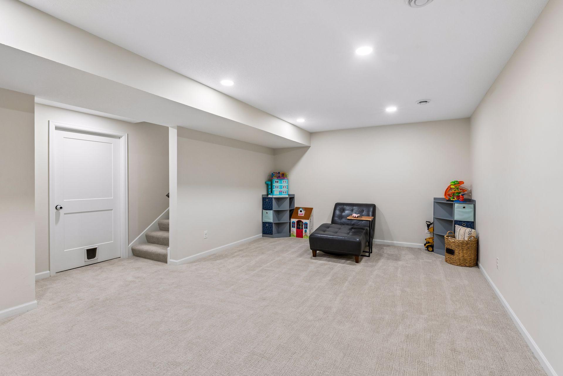 Finished lower level offers a spacious family room with plenty of room for movie nights, play space, or entertaining.