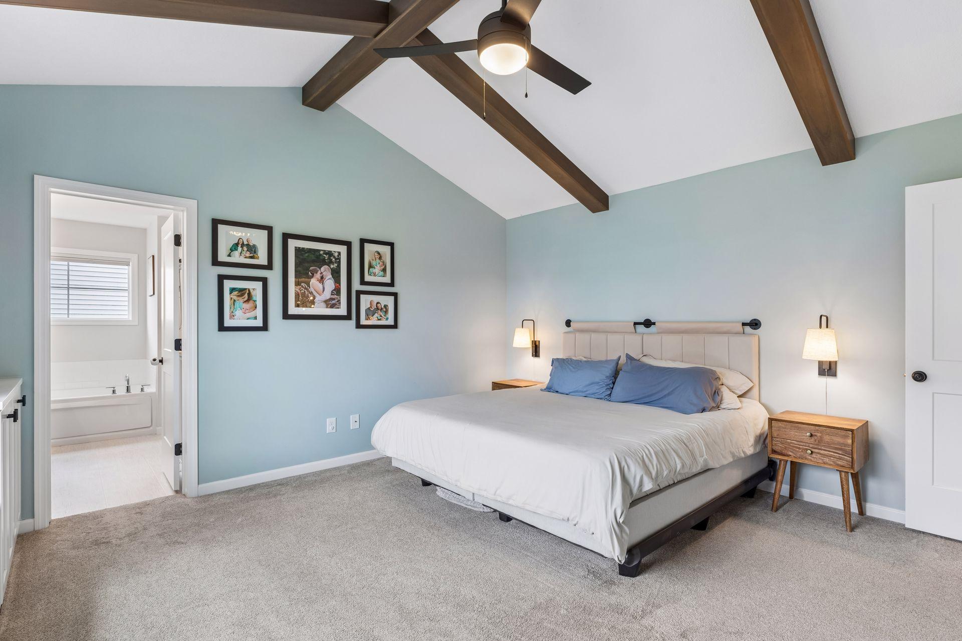 Generous primary bedroom with plenty of space for a full furniture set and easy access to the private ensuite bath.