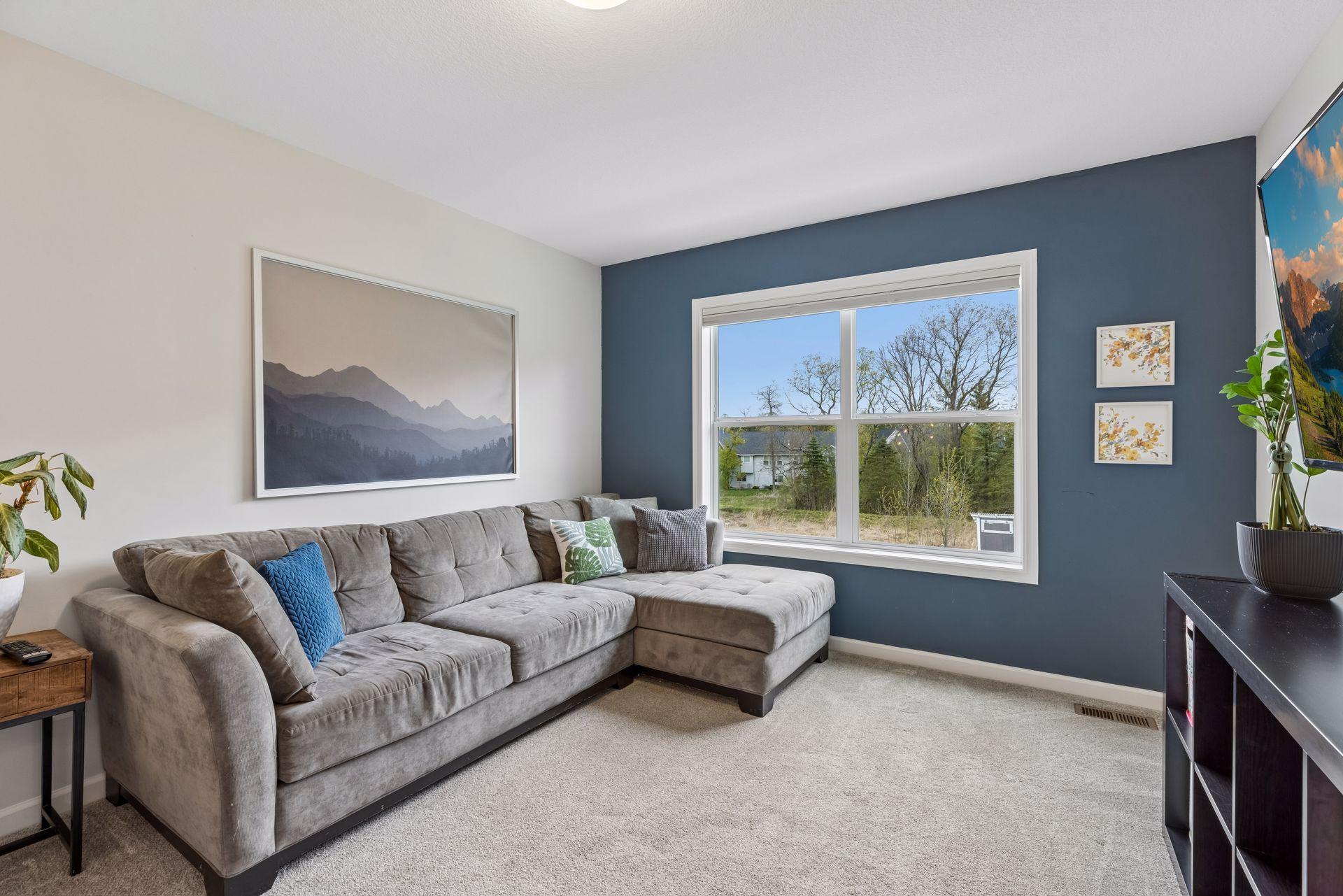 Versatile upper level loft makes a great second living space, playroom, media area, or homework zone.
