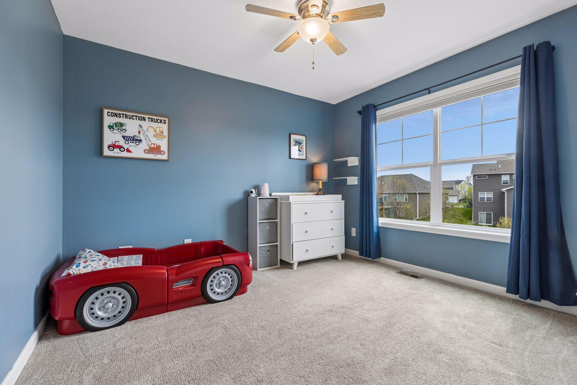 Spacious, third, upper level bedroom.