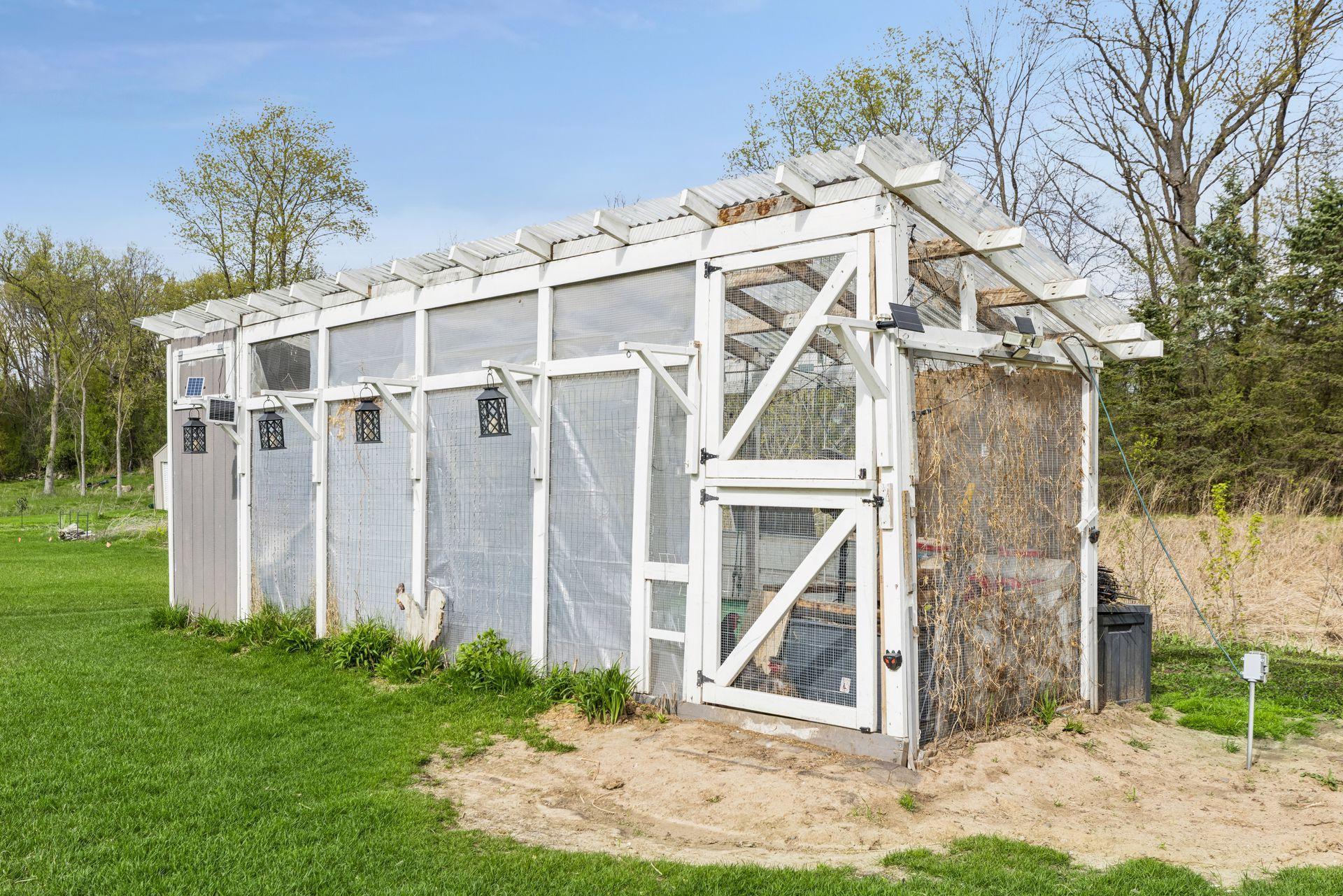 Charming chicken coop adds character to the backyard and offers a fun opportunity for hobby farming or fresh eggs at home.