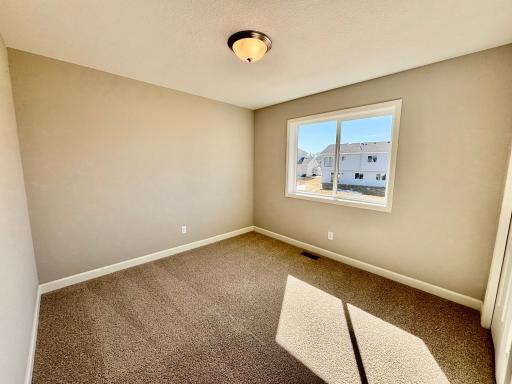 Upper Level Bedroom 3 - The Weston at 11359 5th St NE in River's Edge!