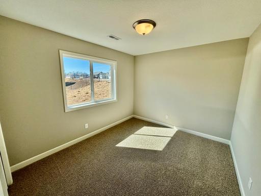 Upper Level Bedroom 2 - The Weston at 11359 5th St NE in River's Edge!