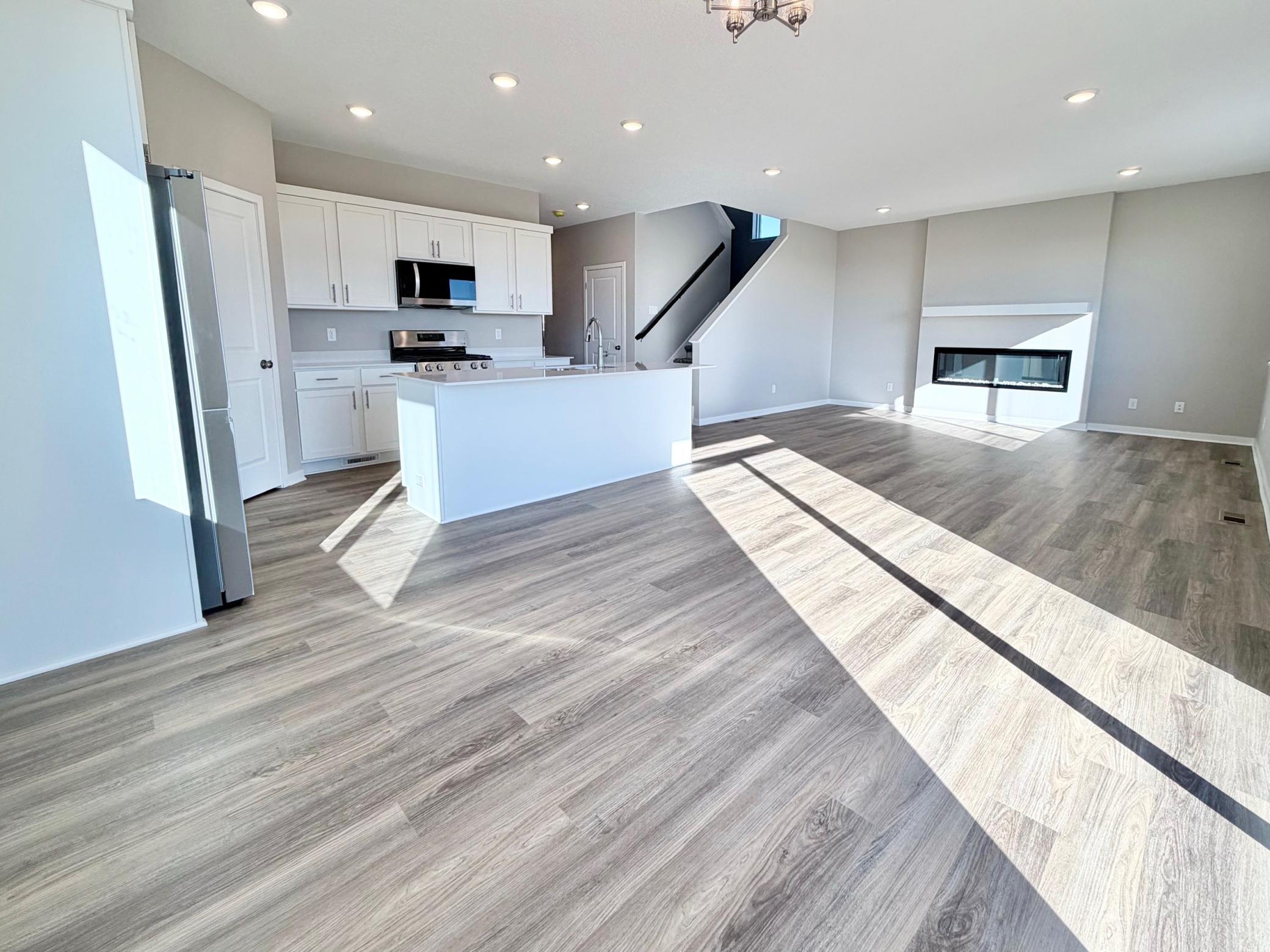PHOTO OF A DIFFERENT HOME WITH SIMILAR PLAN. FINISHES MAY VARY.
