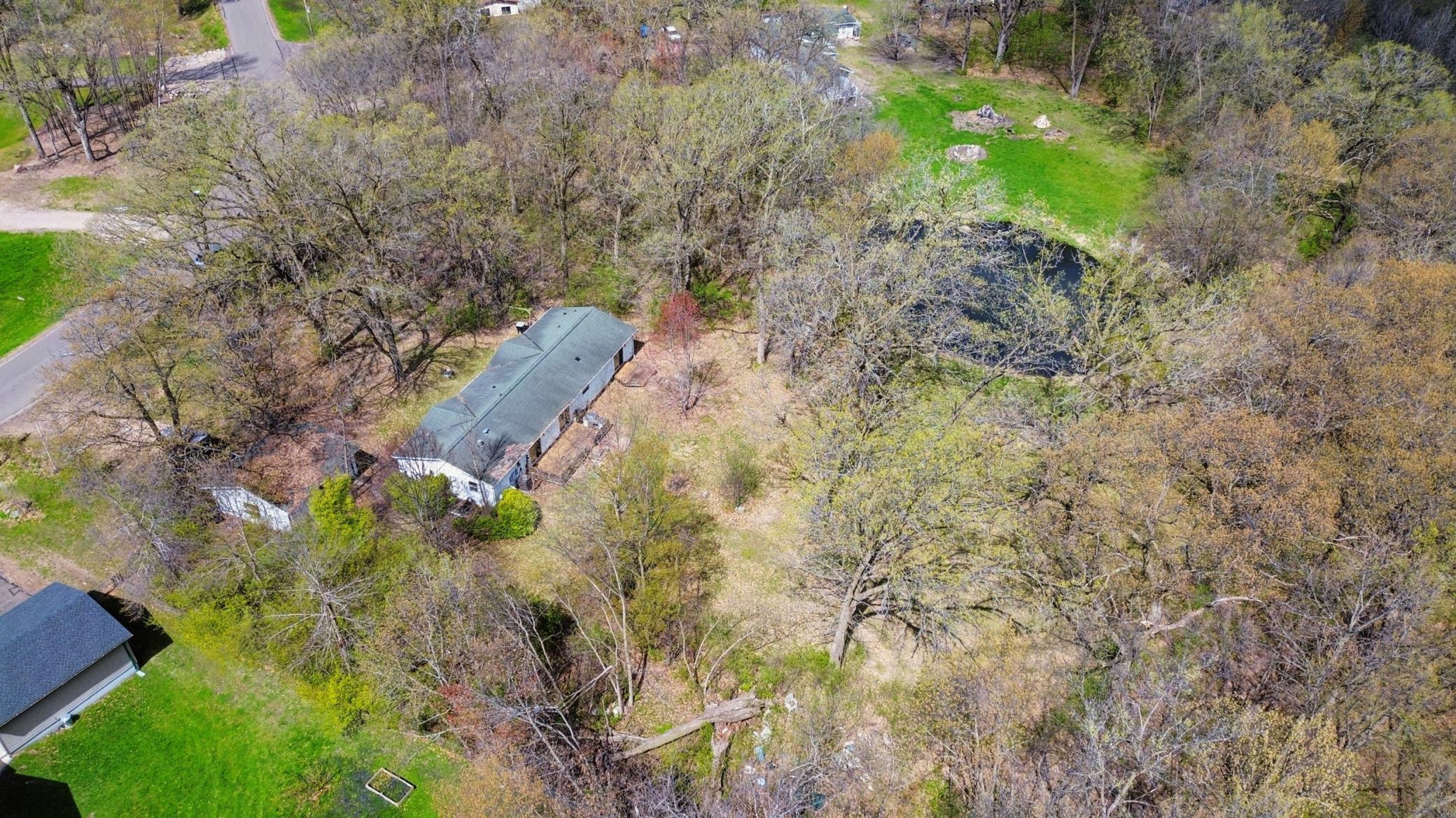 Gorgeous 1.3 acre lot with incredible privacy and pond.
