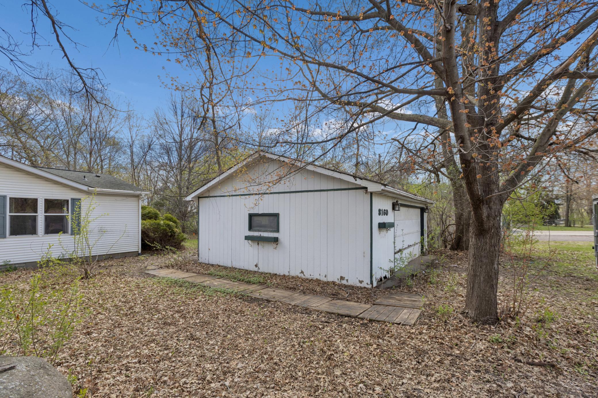 Oversized two car garage provides parking and extra storage/work space.