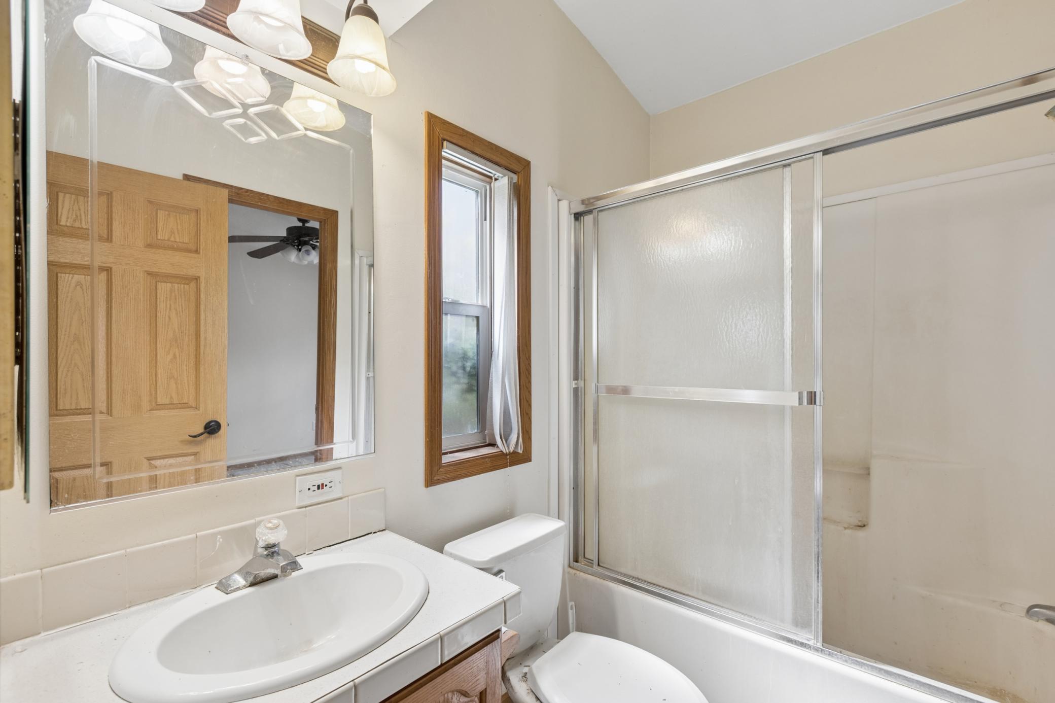 Third bathroom walks thru from utility room to bedroom.