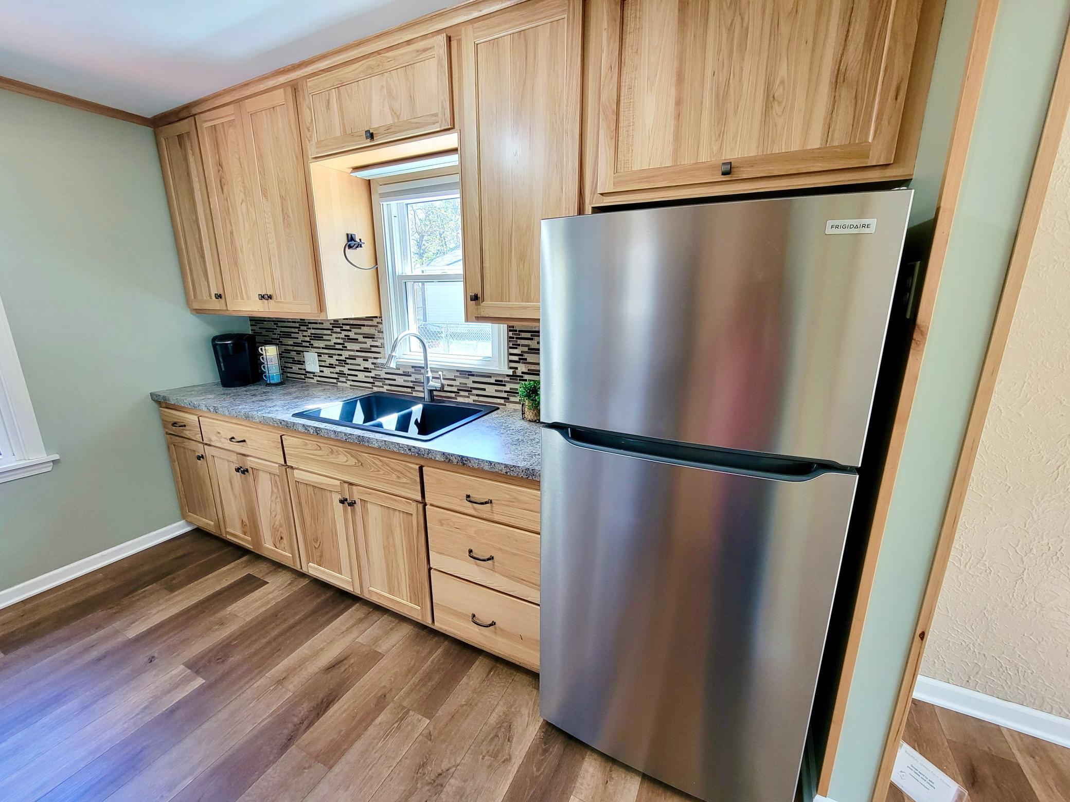 Another view of the kitchen coming from the living room
