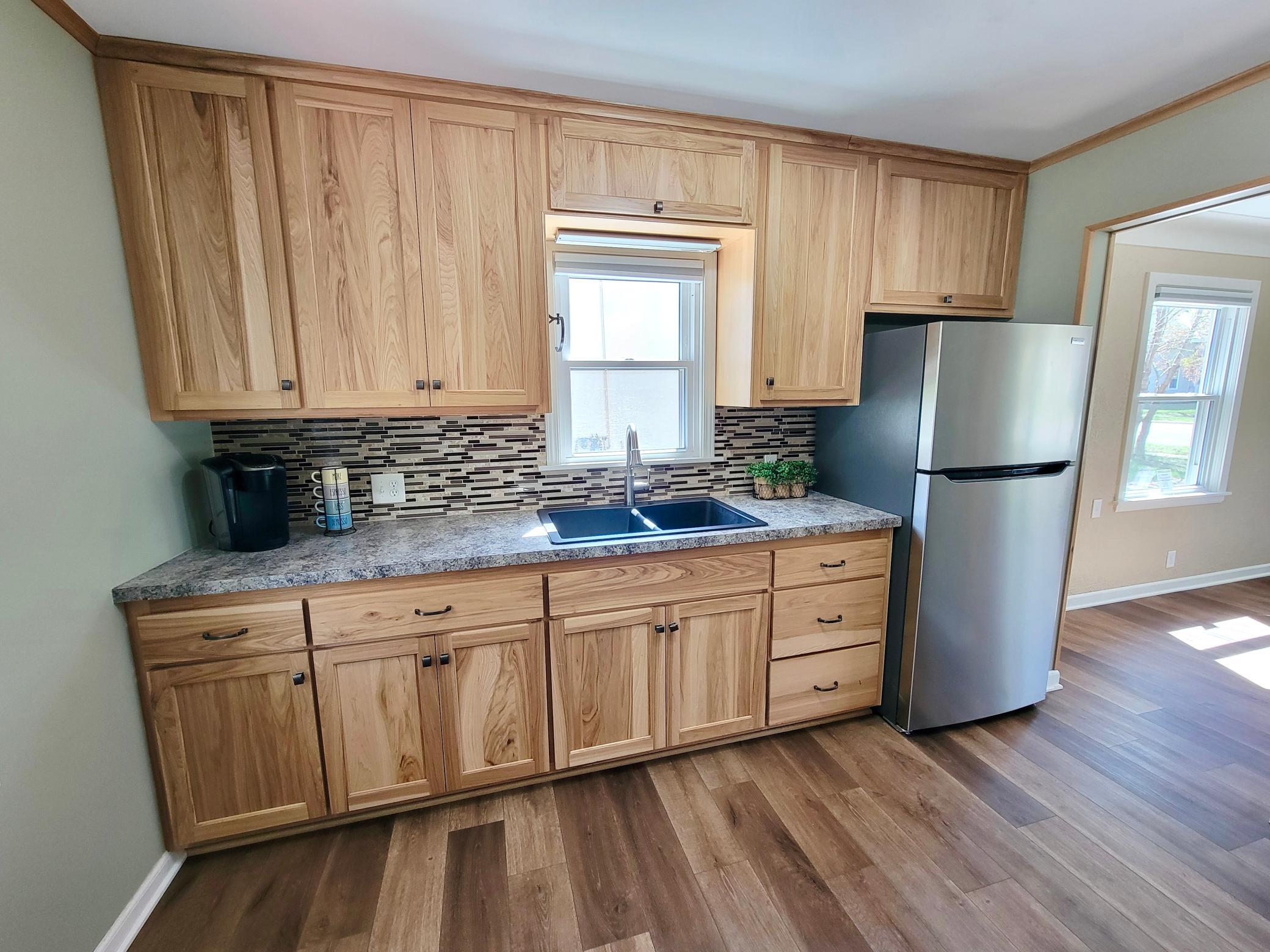 Plenty of cabinet storage, backsplash and counter space.