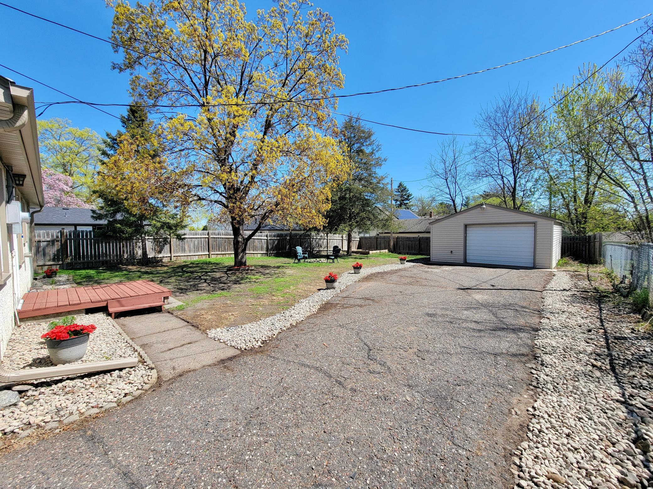 Newly rocked along the house and driveway, newly seeded backyard