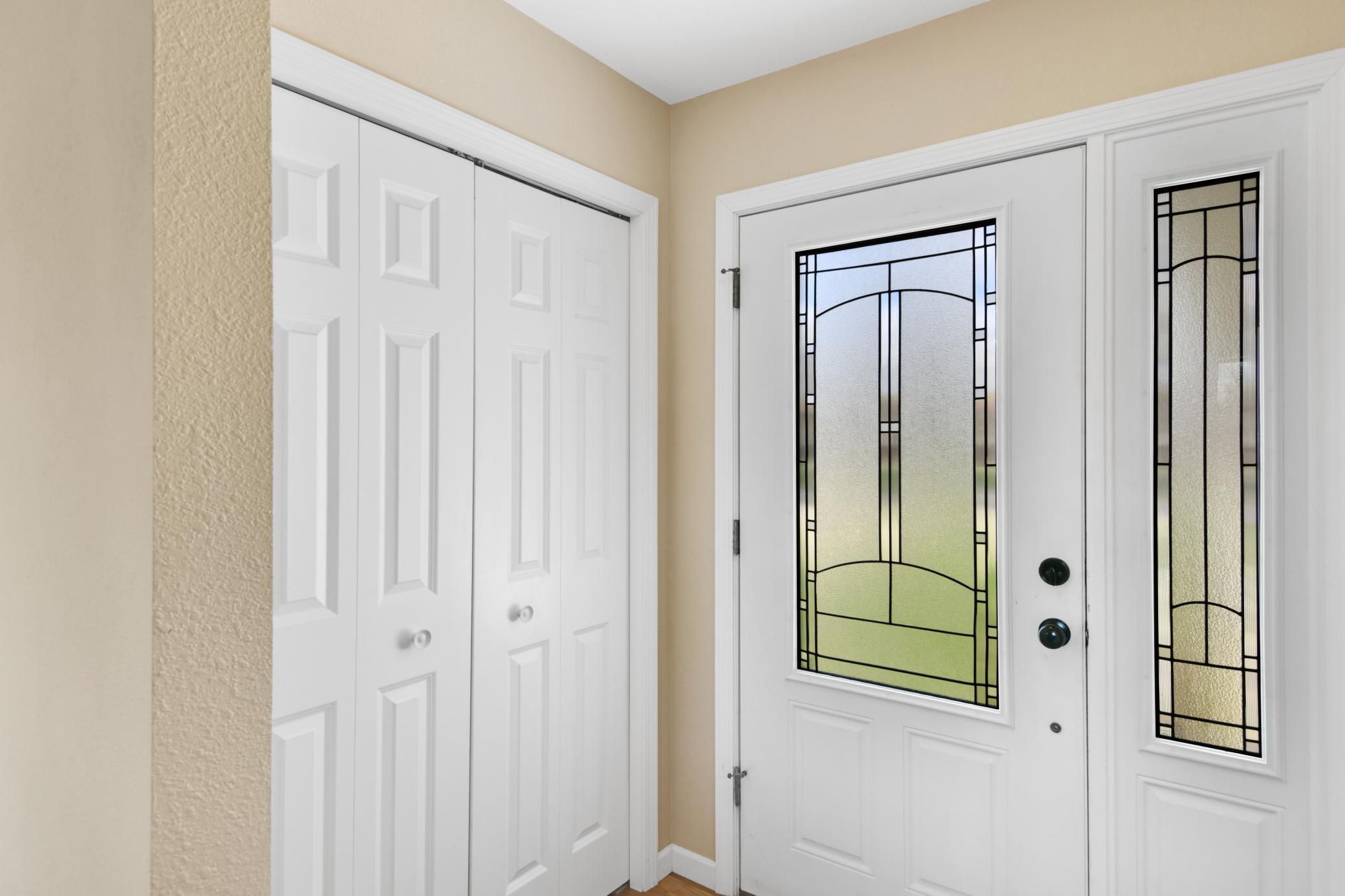Big entry opens to kitchen for easy drop of groceries and more