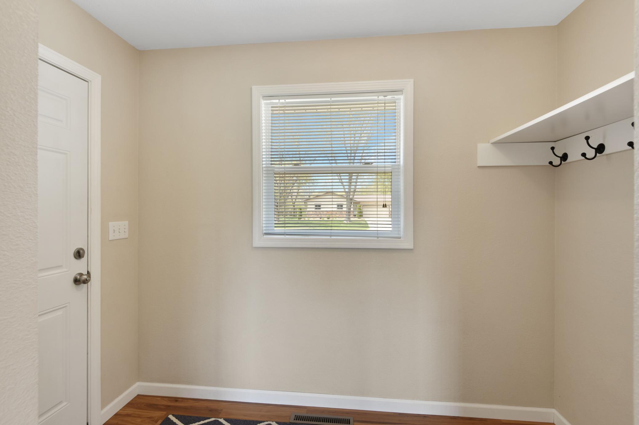 Mudroom off garage enters into the kitchen / dining area, convenience for every day living