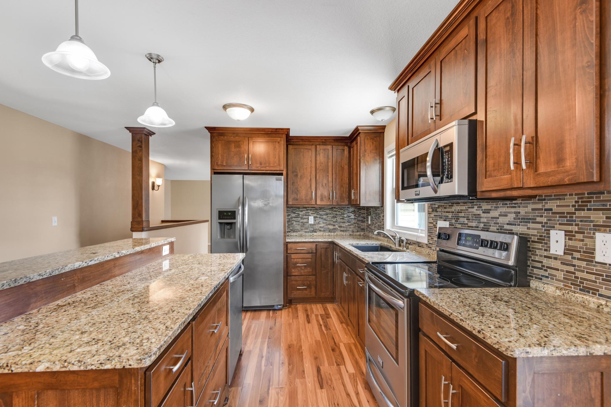Impressive storage and functionality in this stunning kitchen