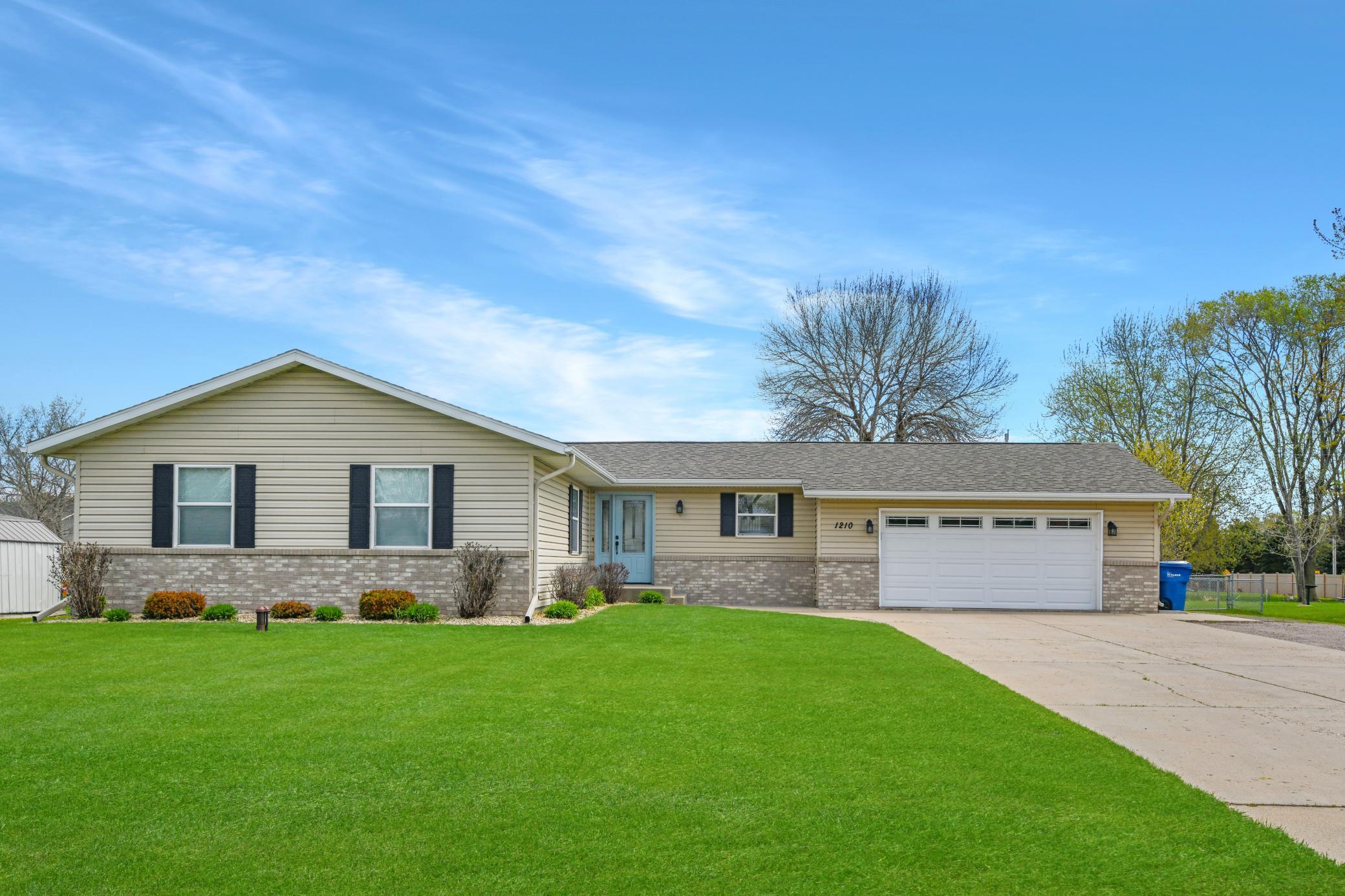 30-year architectural shingles, low maintenance exterior and private well for irrigation