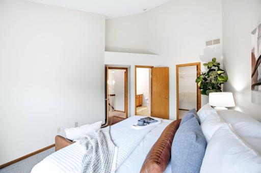 PRIMARY BEDROOM SUITE WITH VAULTED CEILING