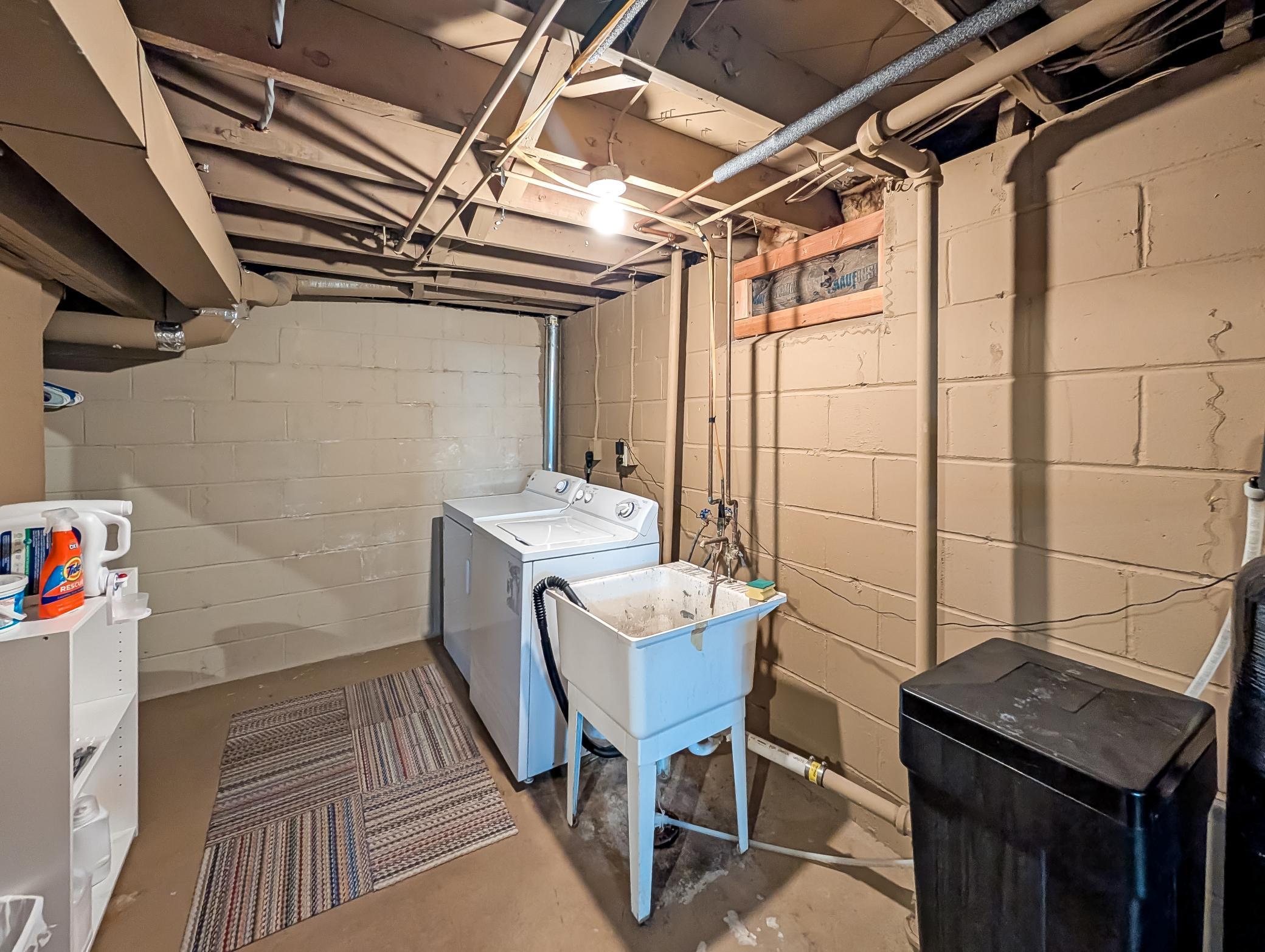 Laundry tucked away in the corner