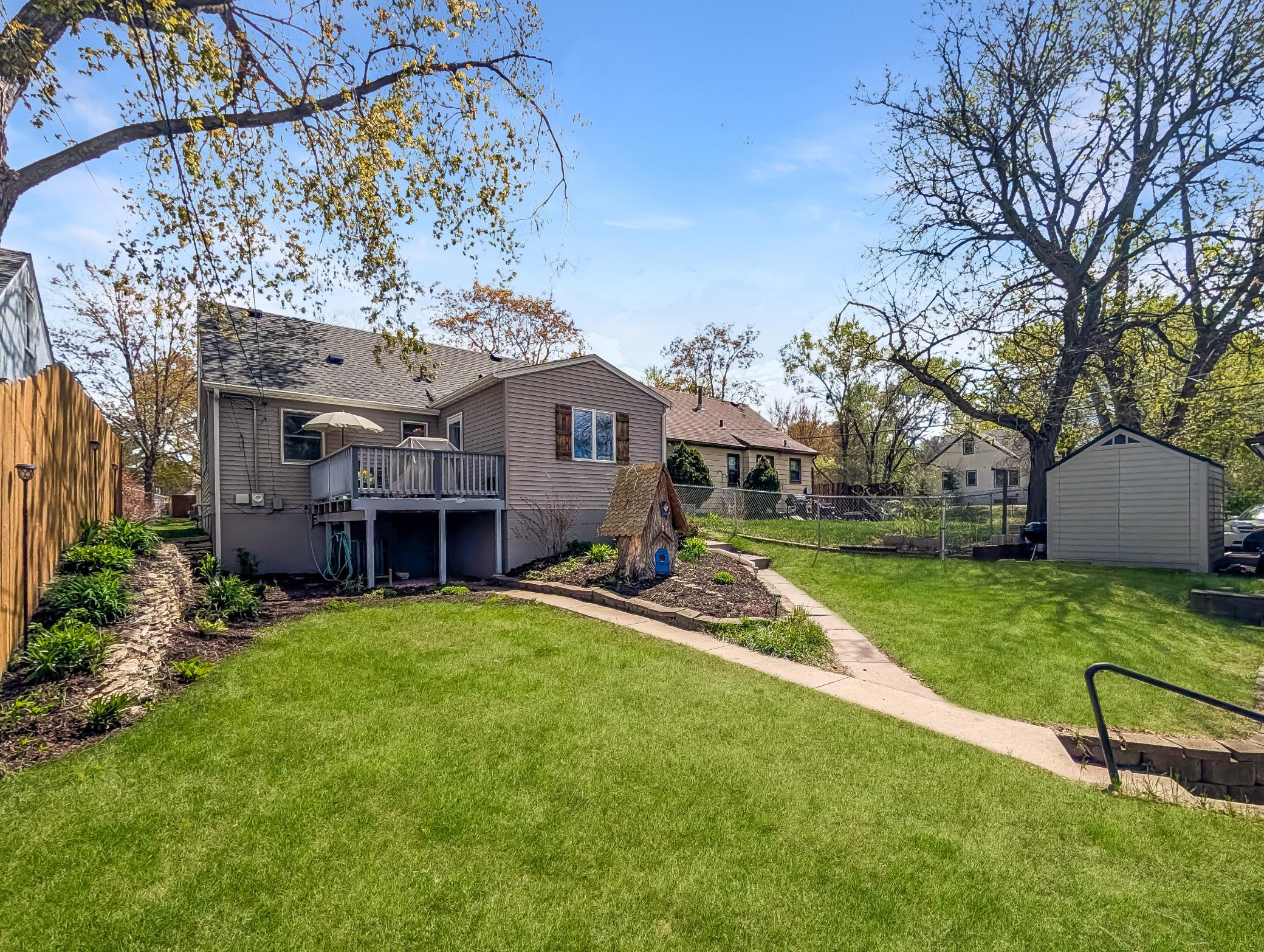 Path from side door and basement door leads to garage!
