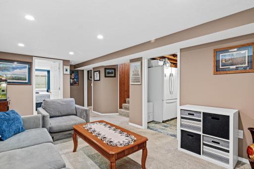 View from family room looking toward laundry room, stairs, bath and bedroom.