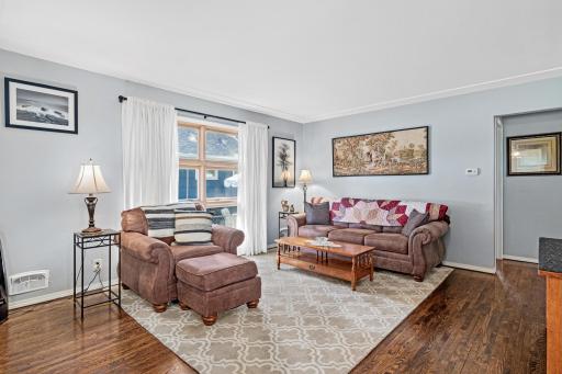 Large window allows natural light to flood the room.