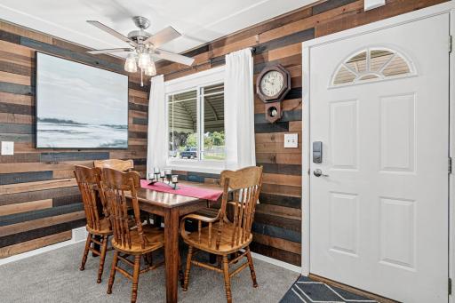 The accent wall in the eating area defines the space and gives it a homey feel.