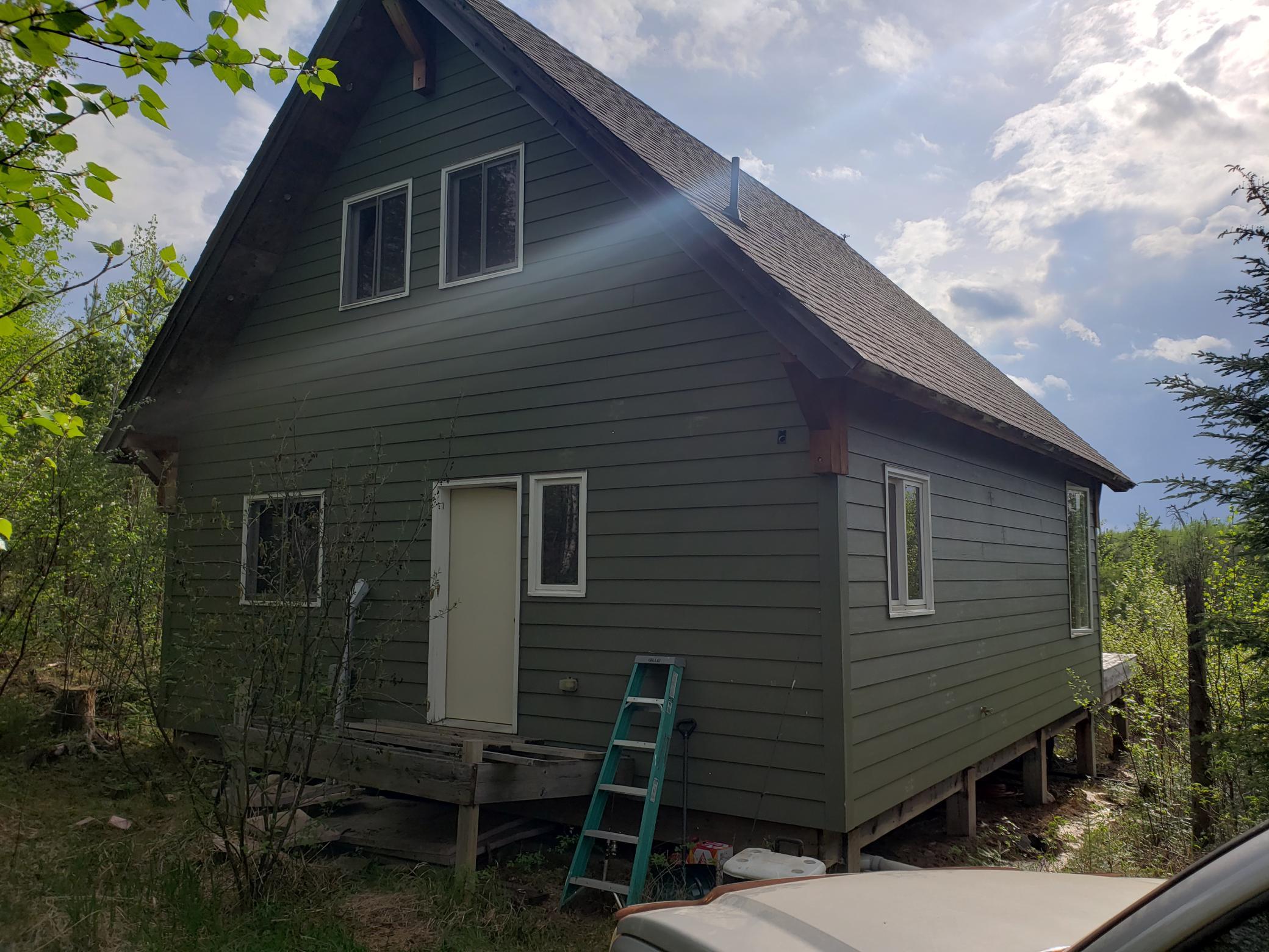 Solid cabin with low maintainance siding