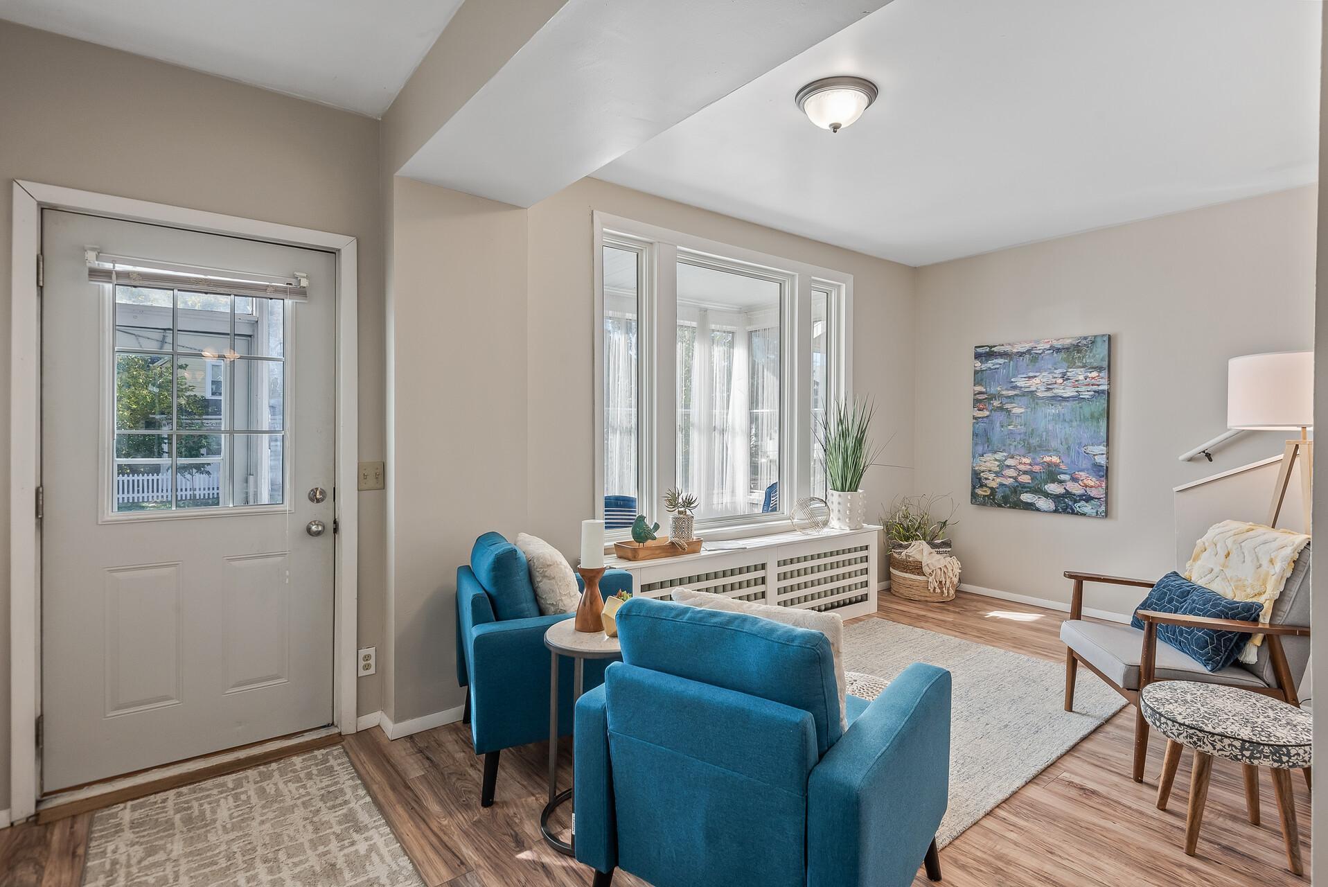 New picture window floods the living room with natural light
