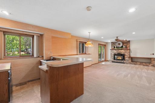 Lower level completed with wet bar, fireplace, and walk out!