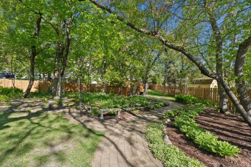 Paver walking paths through the flower gardens