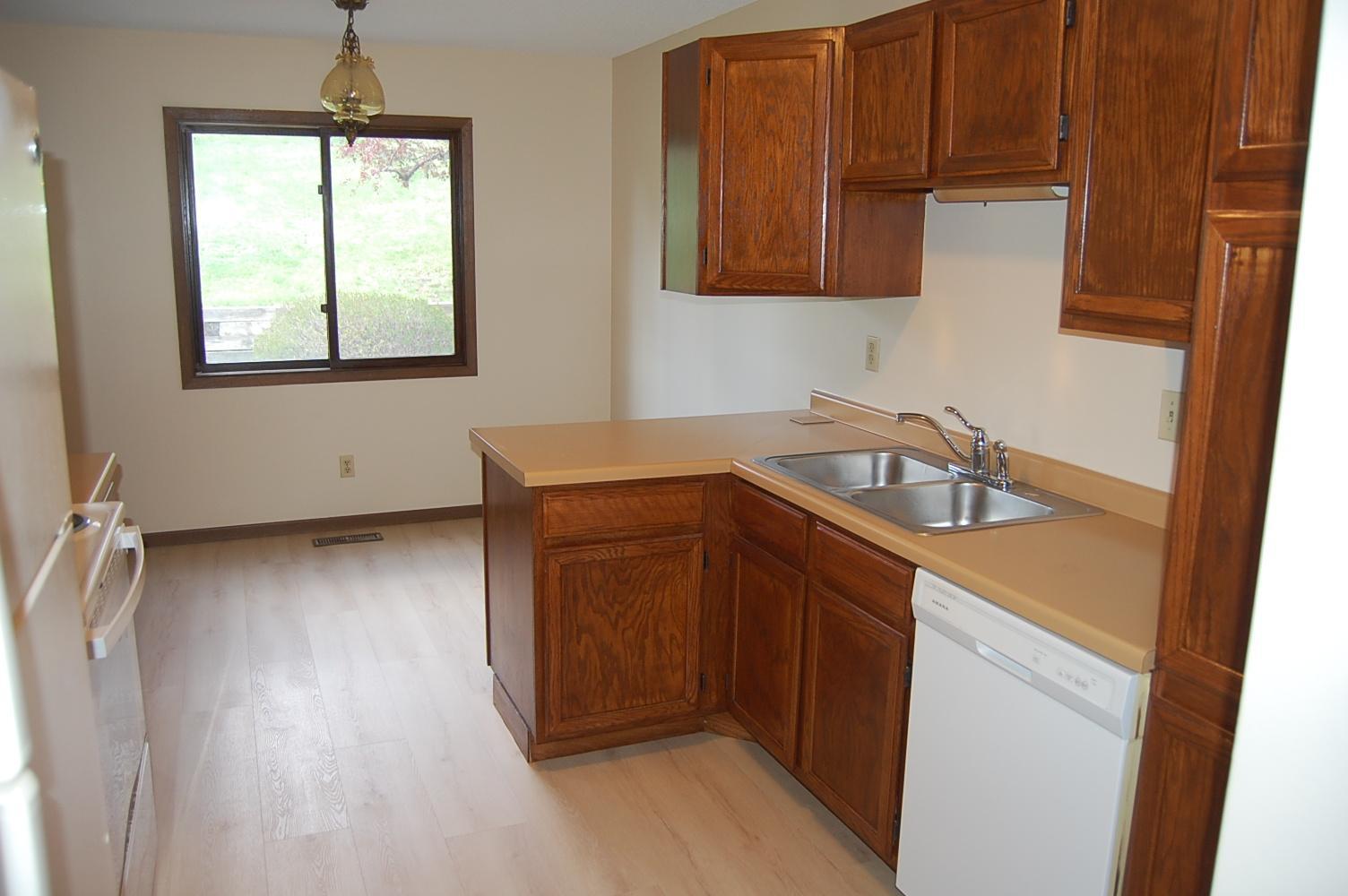 New kitchen floor and spacious informal dining area.