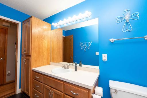 Upper full bathroom with linen closets and lots of drawer space!