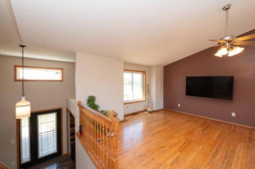 Hardwood flooring in living room & vaulted ceilings