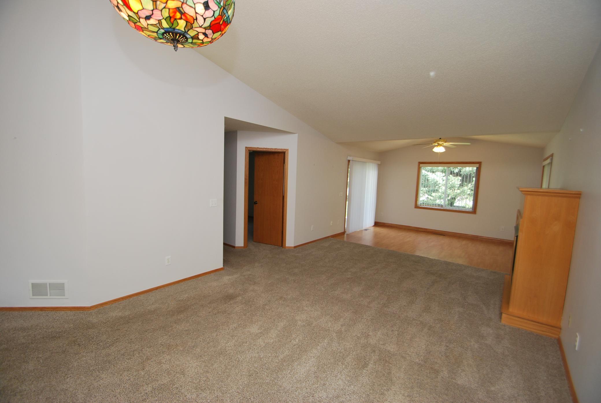 Dining area looking towards the living room and hallway.