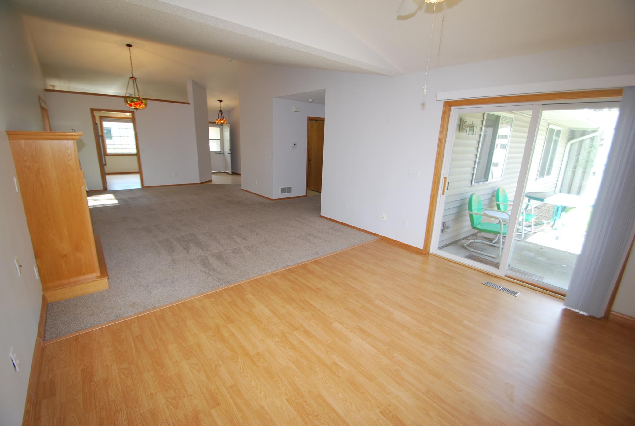 Living room with views of patio