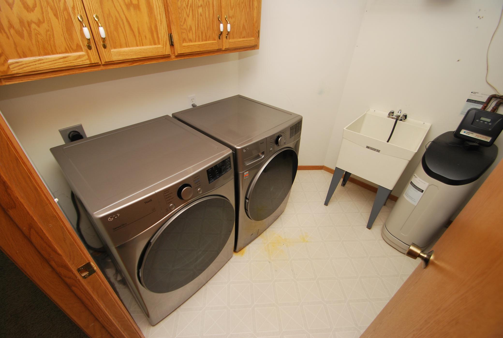 Laundry room includes a laundry tub. Mechanicals are also in this room.