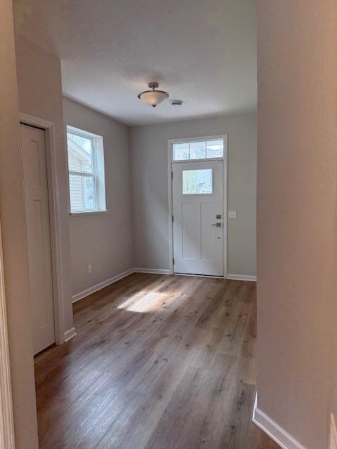 An inviting, spacious entry area greets you, along with a new entry door, complete with a transom window, to maximize light!lete with