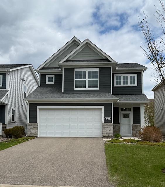 Welcome to 4702 Cranesbill Road, an impeccably-maintained home at the doorstep of Lake Minnetonka!