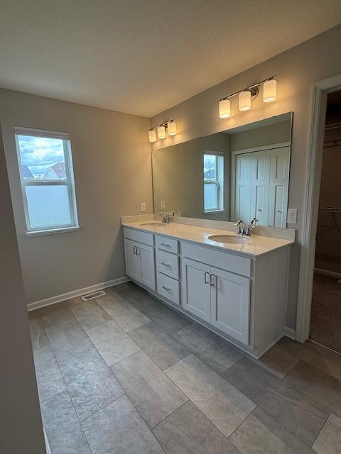 The primary bath features a dual vanity for your convenience!